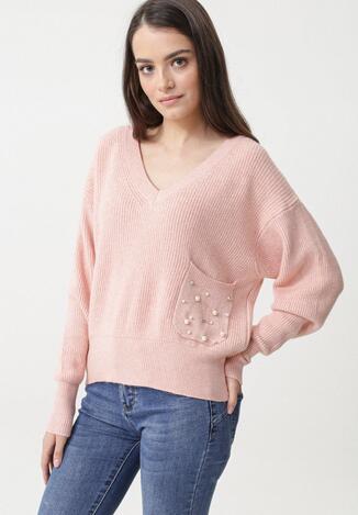 Różowy Sweter Contains