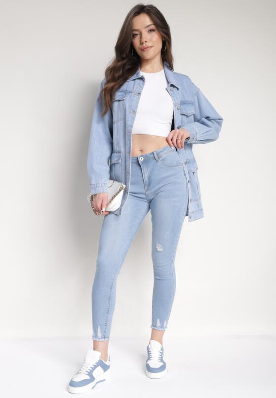 Jasnoniebieskie Jeansy o Dopasowanym Kroju Skinny z Delikatnymi Przedarciami Alringa 1