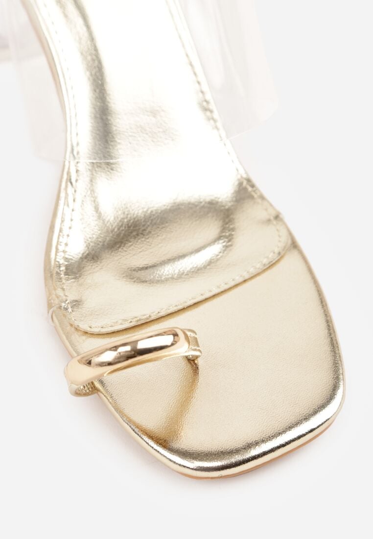 Złote Klapki na Słupku z Transparentnym Paskiem i Obcasem Ryrnell 8