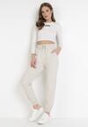 Pantaloni Crem