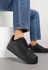 Czarne Skórzane Sneakersy Ozdobione Perforacją Rilurea