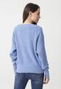Niebieski Sweter Contains