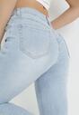 Jasnoniebieskie Jeansy Skinny z Dziurami Tully