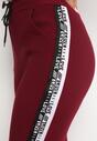 Bordowe Bawełniane Spodnie Dresowe z Lampasami i Ozdobnymi Napisami Sanga