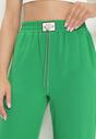 Zielone Spodnie Szerokie z Gumką w Pasie z Ozdobnym Łańcuszkiem Istaria