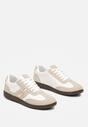 Białe Stylowe Sneakersy na Płaskiej Podeszwie z Geometrycznymi Przeszyciami Rialine