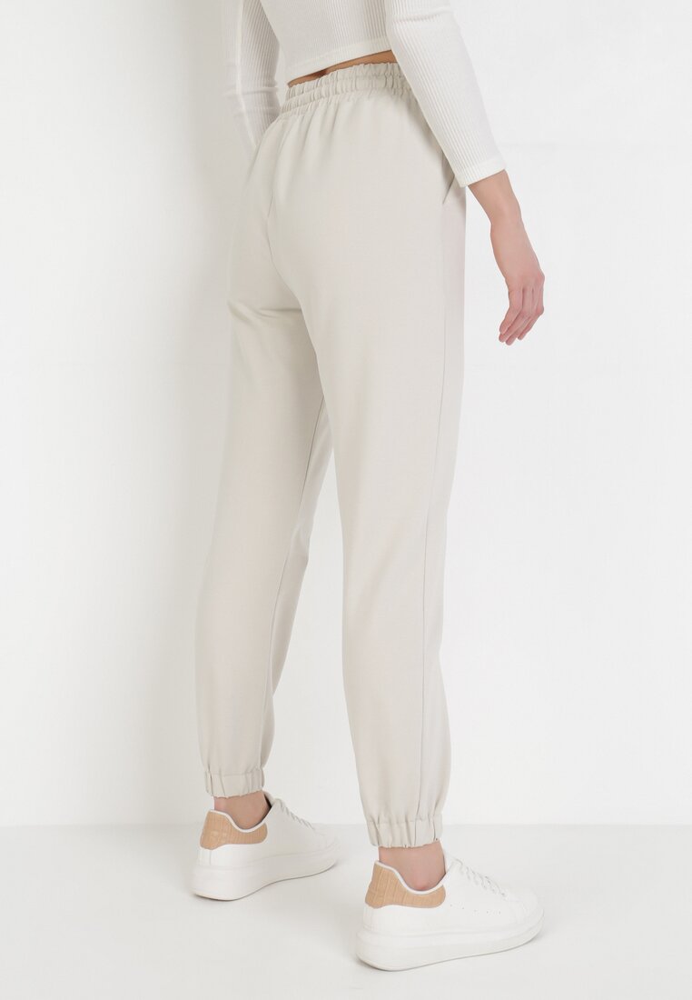 Pantaloni Crem