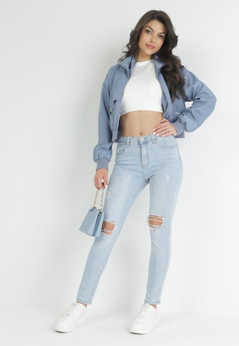 Jasnoniebieskie Jeansy Skinny z Dziurami Tully