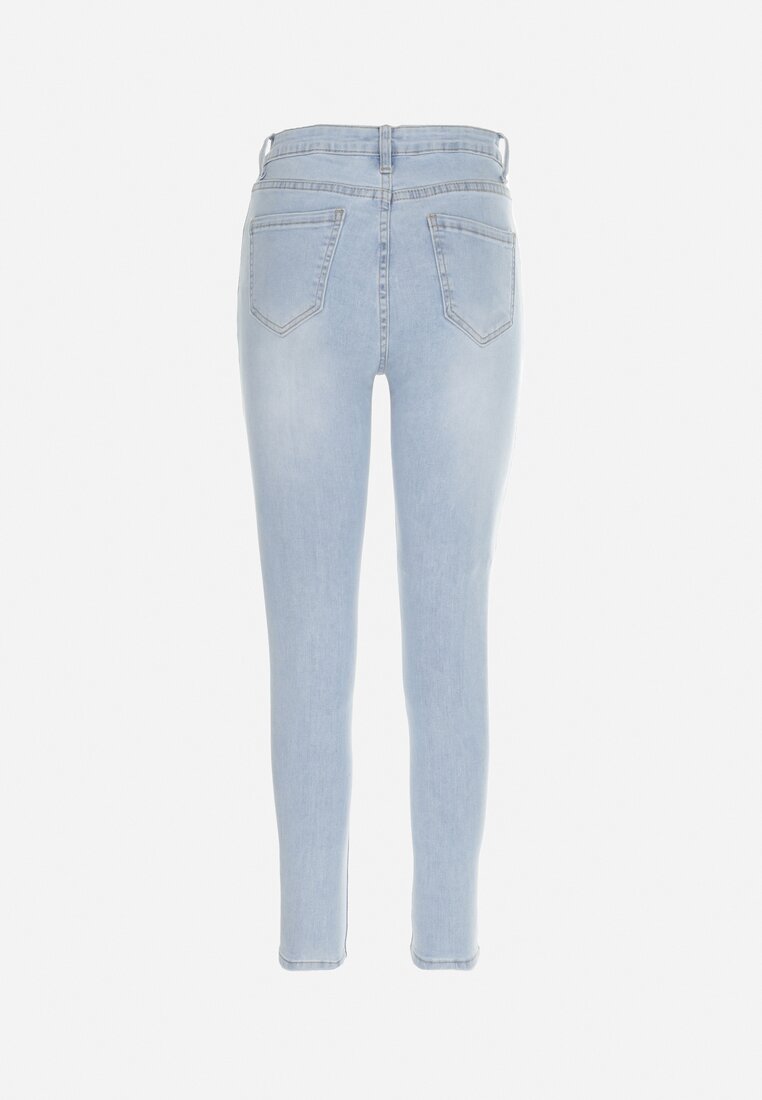 Jasnoniebieskie Jeansy Skinny z Dziurami Tully