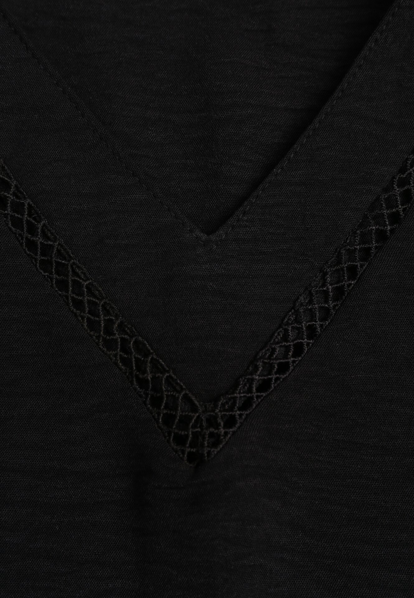 Czarna Bluzka z Rozszerzanym Dołem i Ażurowymi Wstawkami Urinity