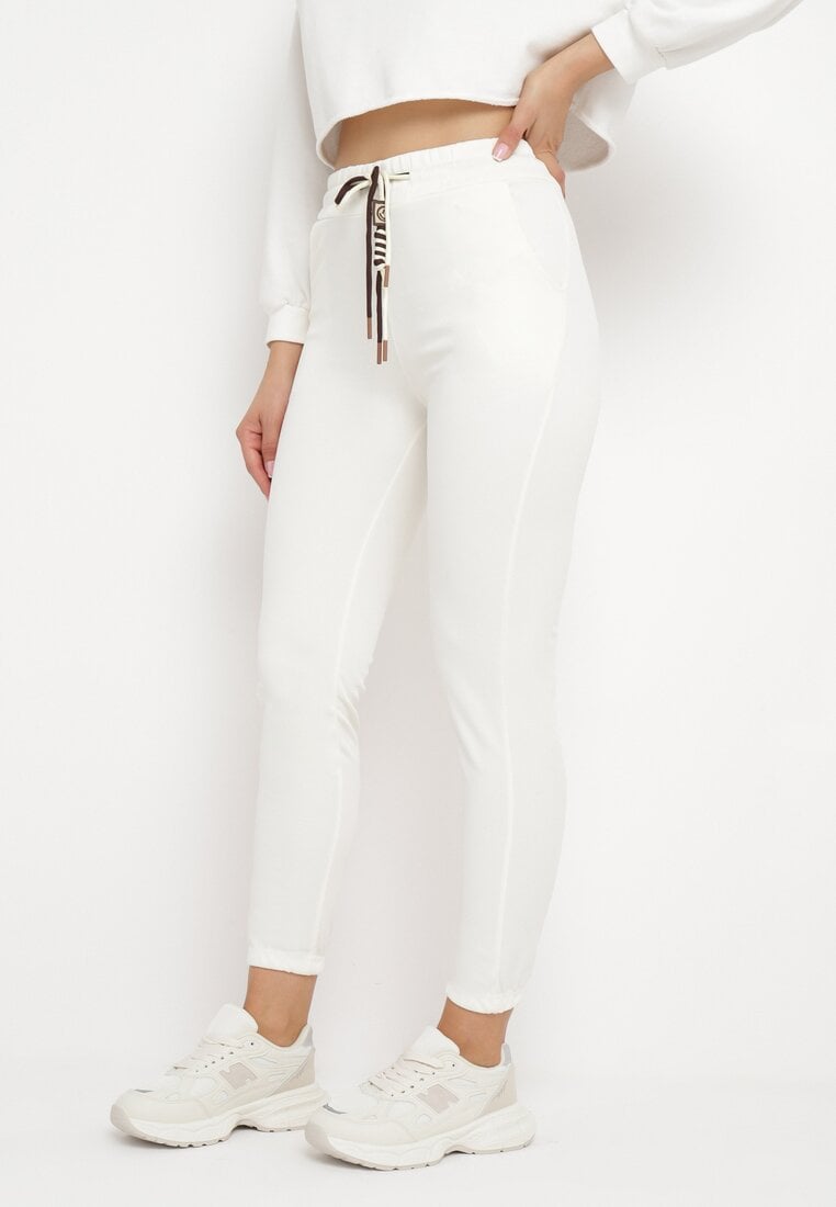 Kremowe Bawełniane Spodnie Dresowe z Gumką w Pasie i Ściągaczami Jumis