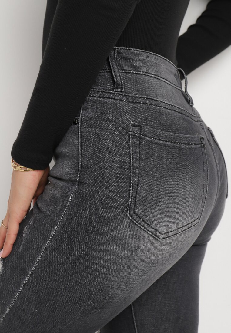 Czarne Jeansy Skinny z Wysokim Stanem i Przetarciami Cassina