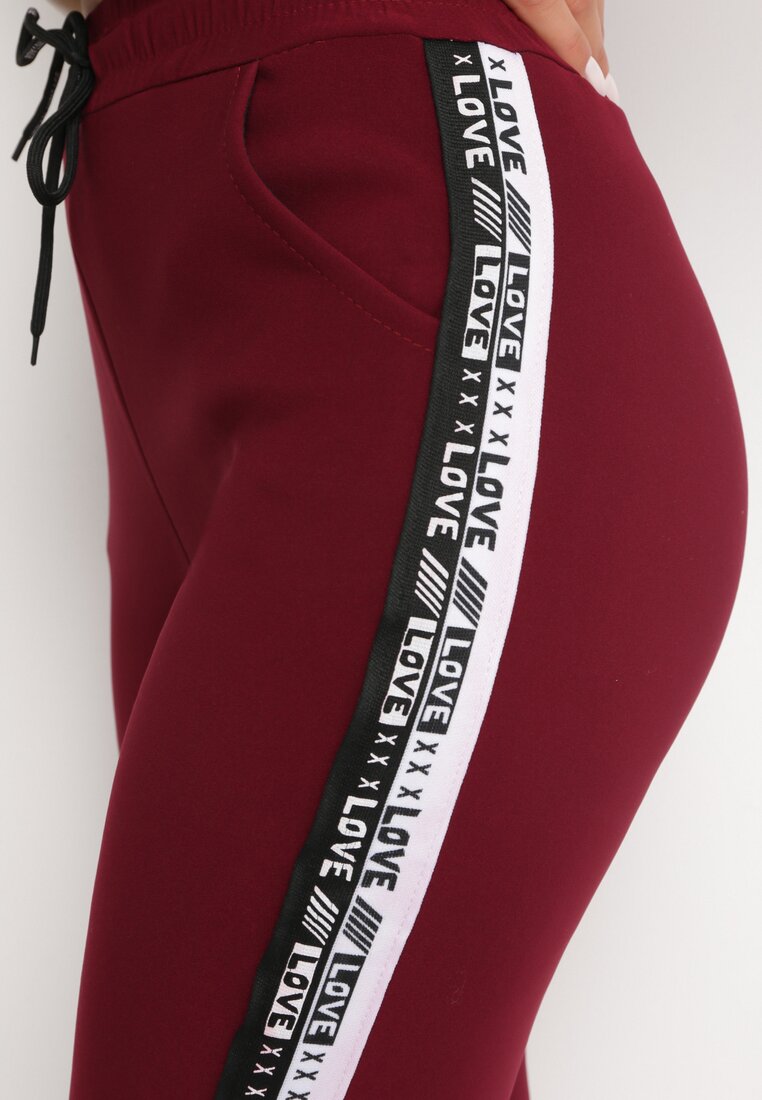 Bordowe Bawełniane Spodnie Dresowe z Lampasami i Ozdobnymi Napisami Sanga