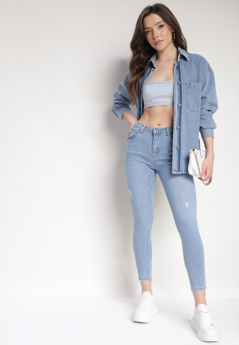 Jasnoniebieskie Jeansy o Fasonie Skinny z Minimalistycznymi Przedarciami Orivea