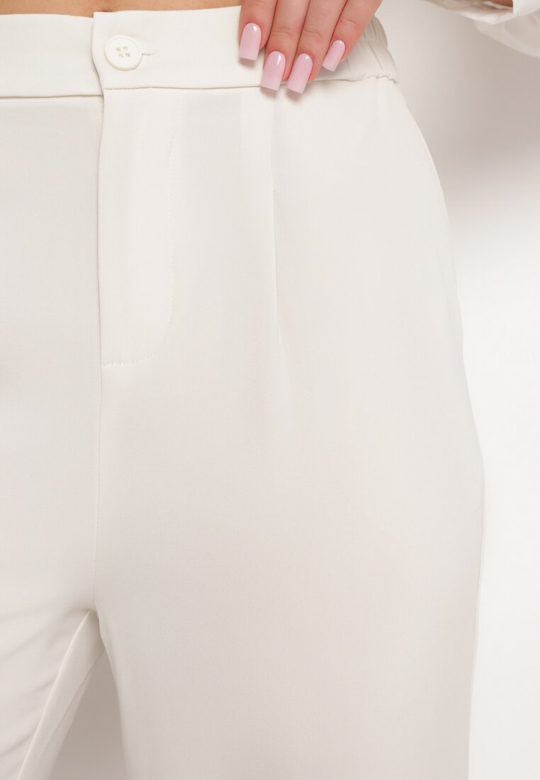 Jasnobeżowe Eleganckie Szerokie Spodnie z Gumką w Pasie Zapinane na Suwak Barcarola