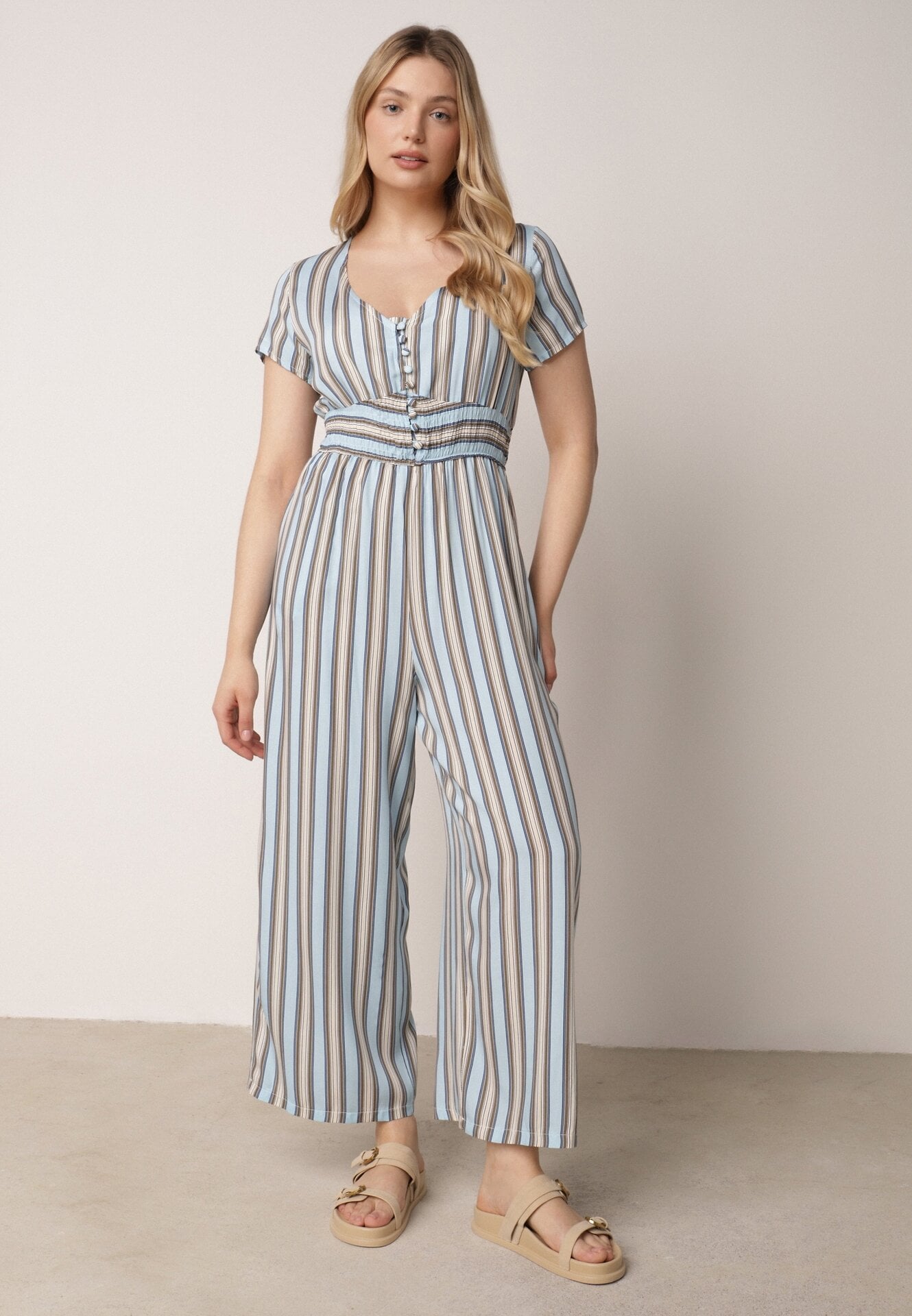 Salopetă de viscoză albastră cu nasturi la decolteu și bandă elastică în talie Tinaleias