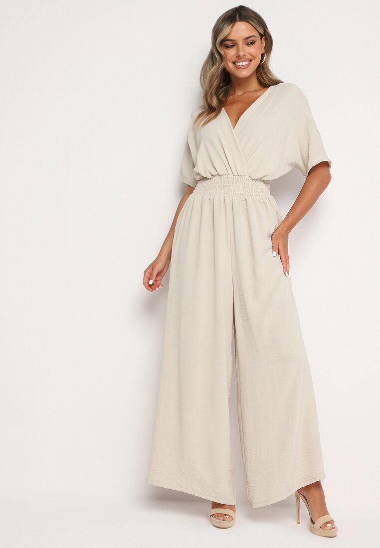 Salopetă petrecută bej cu elastic în talie și craci largi Vimashea