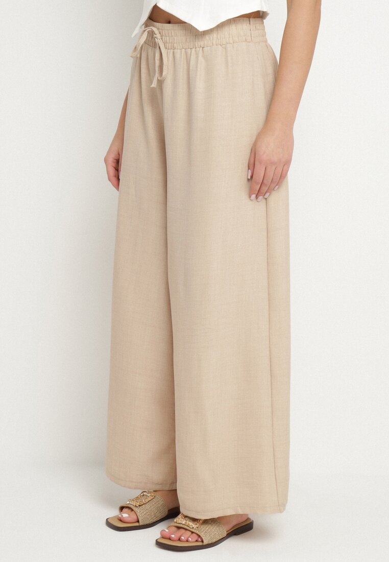 Pantaloni Bej cu croi larg, cu talie înaltă și legătură Telarieta